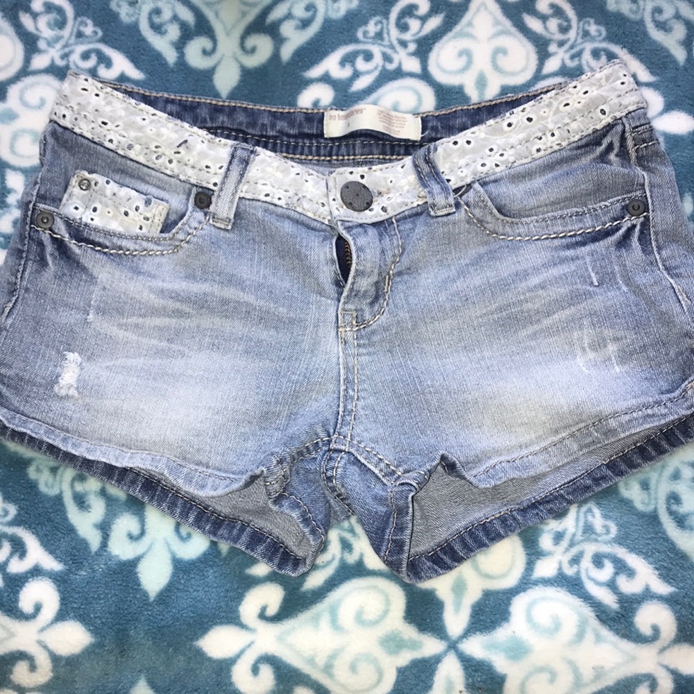 Like new blue jean shorts w/ lace embellishments!